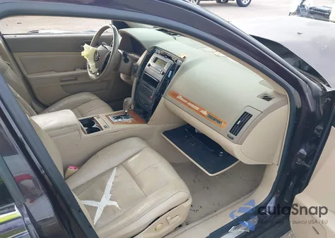 2006 Cadillac Sts V6 z USA, uszkodzony, nr VIN 1G6DW677X60139120